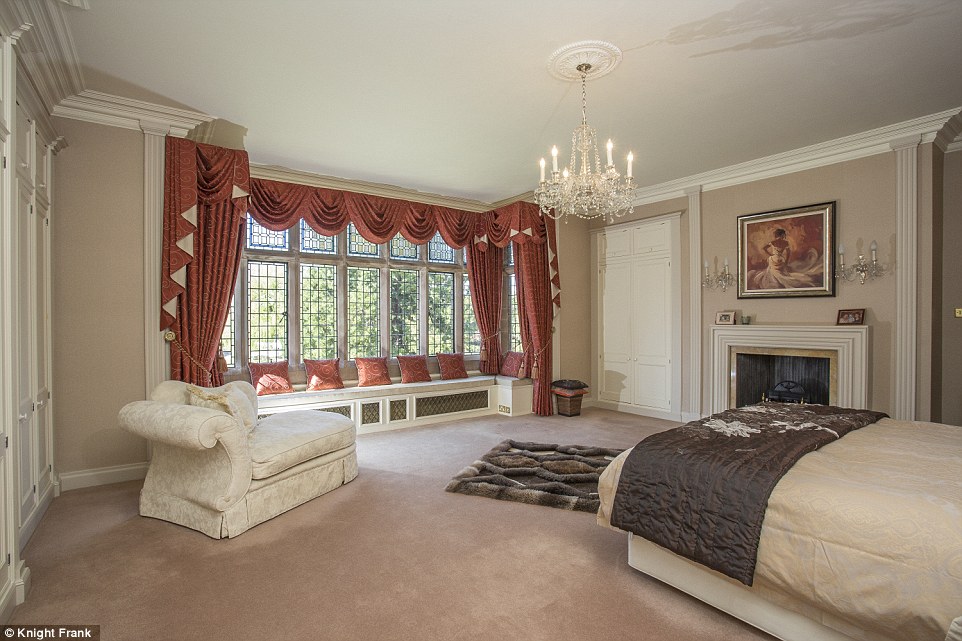 3C0E21D300000578-4110416-The_bedrooms_are_plush_and_kitted_out_with_fire_places_chandelie-a-99_1484165733787